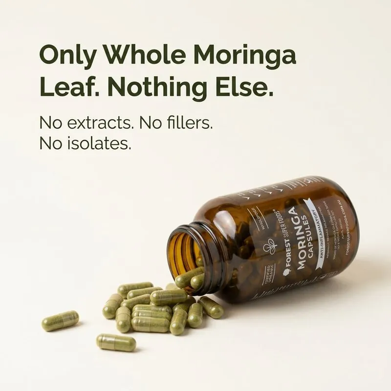 Forest Super Foods Moringa capsules spilling from an amber jar, with the words: only whole Moringa leaf, nothing else