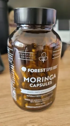 Customer photo by Stephen K.: Forest Super Foods Moringa capsules jar on a kitchen bench
